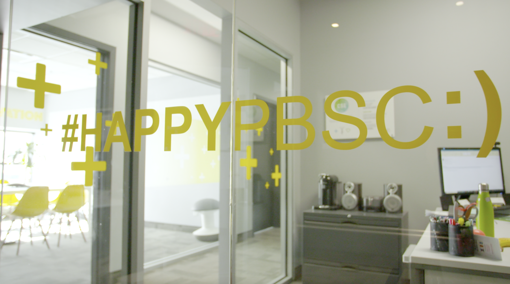 Happy man on a yellow bike dressed in black